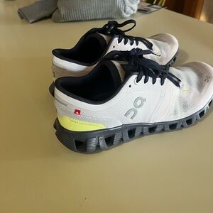 On Running Shoes with Blue and White Design